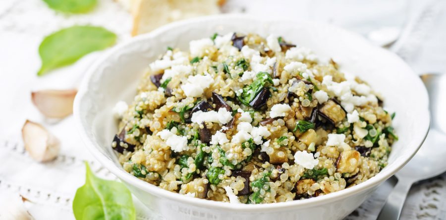 Quinoa Salad Topped with Green Onion and Carrots